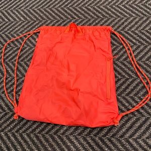 Lululemon coral draw string backpack